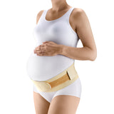 Tonus Elast Gerda Lux Gerda Lux Comfort Stretch Maternity Belt helps relieve tension on the lower back and supports the abdomen during pregnancy.  This narrow, slightly padded contoured belt stays in place. The belt can be worn after delivery to restore muscle tone, postpartum. Soft, flexible elastic accommodates growth of baby throughout term Measure 4.5 in width - this narrow belt stays in place, but expands to adjust to a growing abdomen.  Tonus Elast sold by Flexamed.com